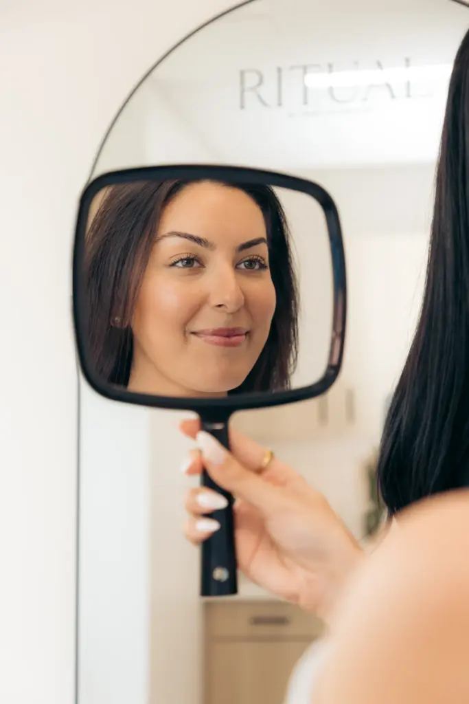 A Woman is receiving Brow and Lash Services at Ritual by Tracy Holzman NP-C in Washington, DC
