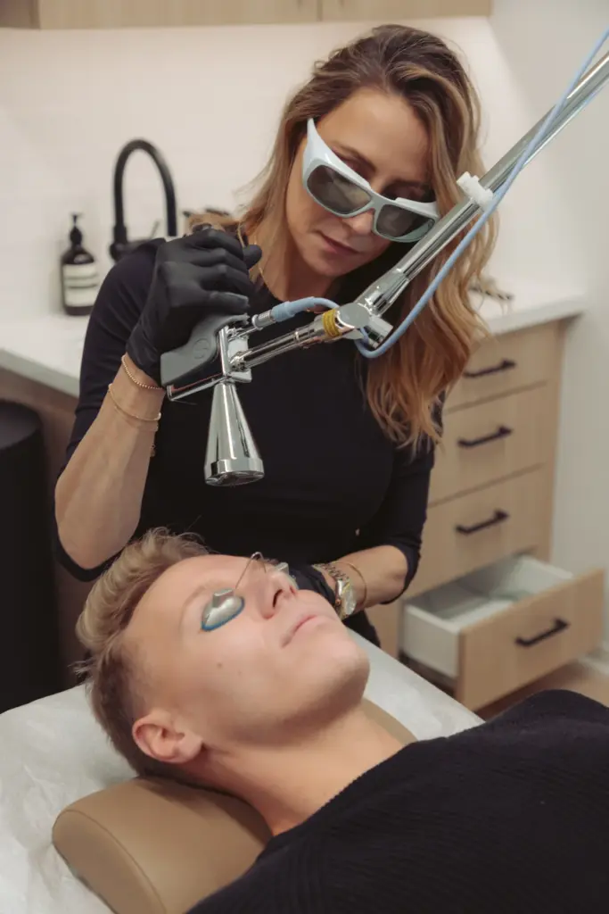 A man is receiving Contour TRL Laser Treatment at Ritual by Tracy Holzman NP-C in Washington, DC