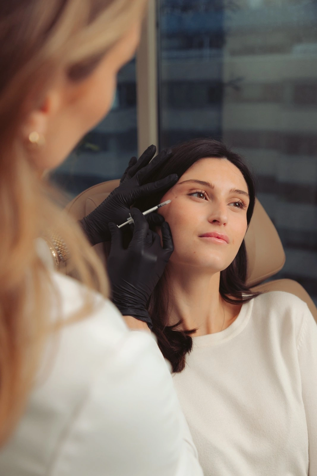 A woman is receiving Baby Botox Treatment at Ritual by Tracy Holzman NP-C in Washington, DC